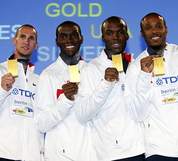 LaShawn Merritt, Angelo Taylor, Jeremy Wariner and Kerron Clement of the US celebrate winning the men's 400x4 gold medal