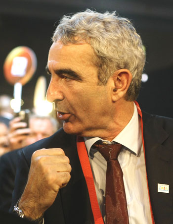 France's coach Raymond Domenech gestures before the 2010 World Cup draw in Cape Town on Friday