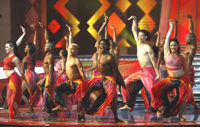 Dancers perform on stage at the start of the show before for the 2010 World Cup draw in Cape Town on Friday