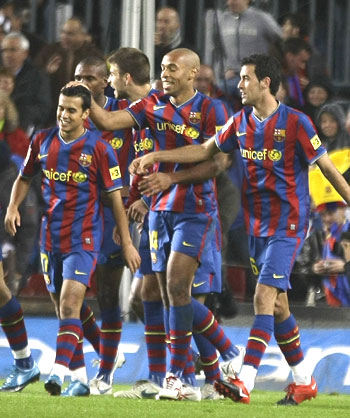 Barcelona's Thierry Henry (centre) with team-mates