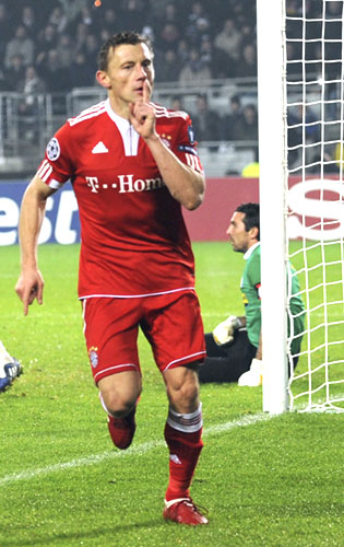 Bayern Munich's Ivica Olic celebrates after scoring past hapless Juventus 'keeper Gianluigi Buffon