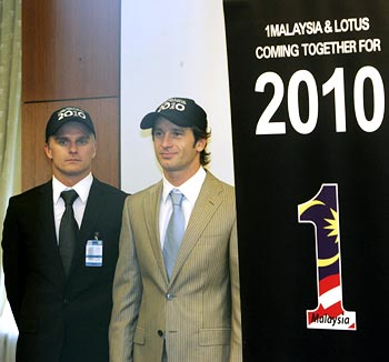 Lotus F1 drivers Jarno Trulli (right) and Heikki Kovalainen