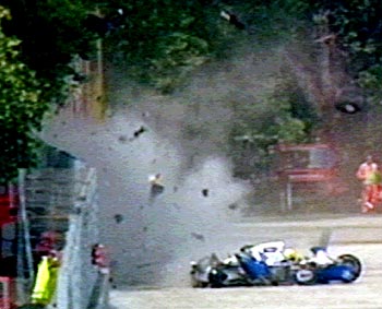 Wreckage from Ayrton Senna's car flies through the air at the San Marino Grand Prix on May 1, 1994