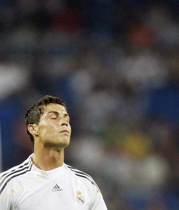 Real Madrid's Cristiano Ronaldo reacts during their Peace Cup match against Saudi Arabia's Al-Ittihad in Madrid