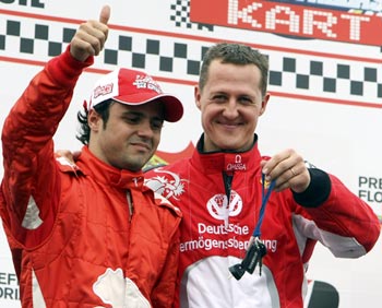 Michael Schumacher (right) with Felipe Massa