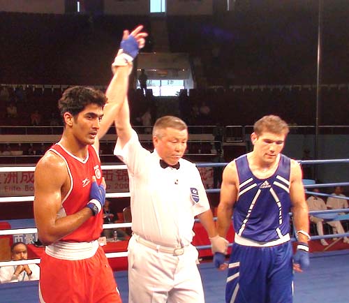 Vijender Singh beat Atoev Abbos