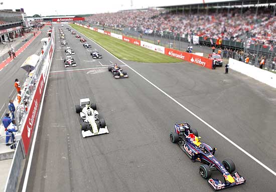 Cars take off at the start of the British Grand Prix