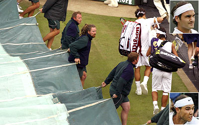 Roger Federer and Rafael Nadal walk off court after rains interrupted the Wimbledon 2008 final