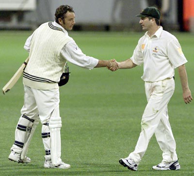Craig McMillan and Steve Waugh at the end of the Brisbane Test.