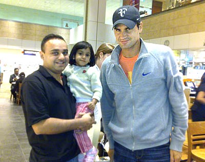 Roger Federer with Mitesh and his daughter Natasha