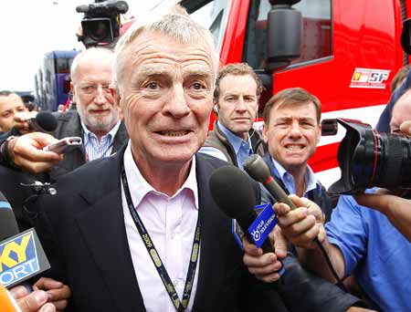 FIA President Max Mosley surrounded by reporters