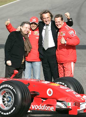L to R: Ferrari's team manager Jean Todt, Brazilian driver Felipe Massa, Chairman Luca Cordero di Montezemolo, and Michael Schumacher