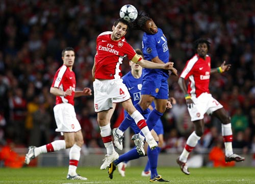 Arsenal captain Cesc Fabregas (left) and Anderson of Manchester United
