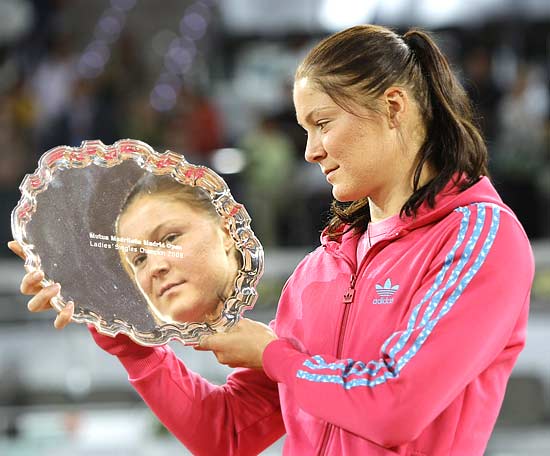 Dinara Safina poses after winning the trophy at the Madrid Open on May 17, 2009.