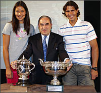 Rafael Nadal, French Tennis Federation head Jean Gachassin and Serbia's Ana Ivanovic at the draw ceremony for the French Open tennis tournament in Paris on Friday