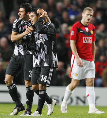 Besiktas' Rodrigo Tello celebrates his goal against Manchester United