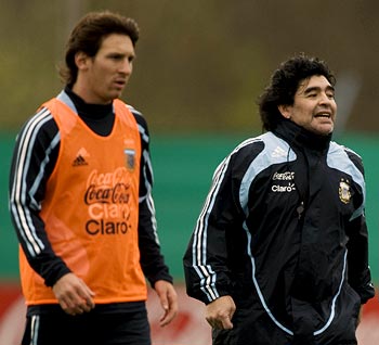 Diego Maradona (right) with Lionel Messi