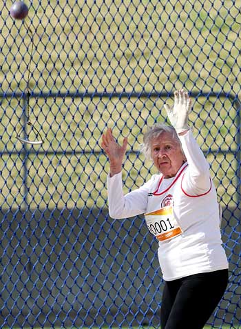 Olga Kotelko, 90, from Canada competes in the women's hammer throw