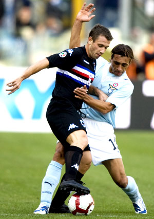Sampdoria's Cassano and Lazio's Siviglia vie for possesion during their Serie A match in Rome on Sunday