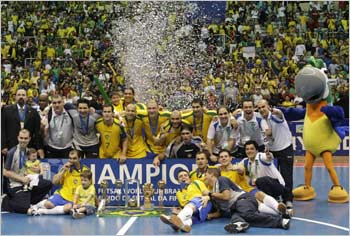 Brazil's players celebrate after winning the FIFA Futsal World Cup final soccer match in Rio