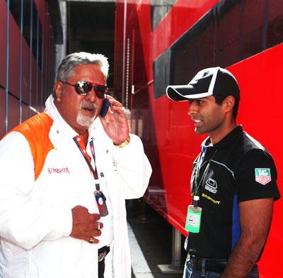 Karun Chandhok (right) with Force India owner Dr Vijay Mallya