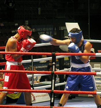 Vijender Singh (left) in action against Kazakhstan's Azamat Belgibayev