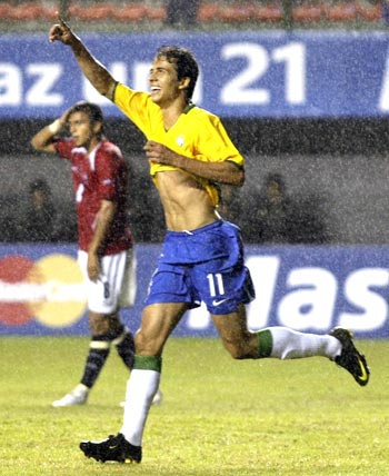 Brazil's Nilmar celebrates after scoring against Chile