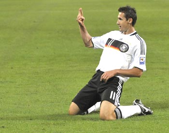 Germany's Miroslav Klose celebrates after scoring against Azerbaijan