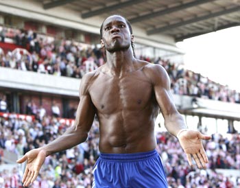 Didier Drogba celebrates after Chelsea beat Stoke City