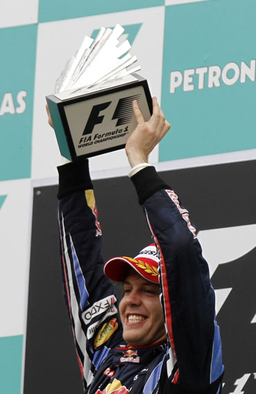 Sebastian Vettel with the trophy