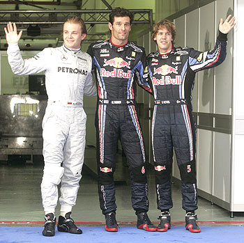 Mark Webber (centre), Nico Rosberg (left) and Sebastian Vettel