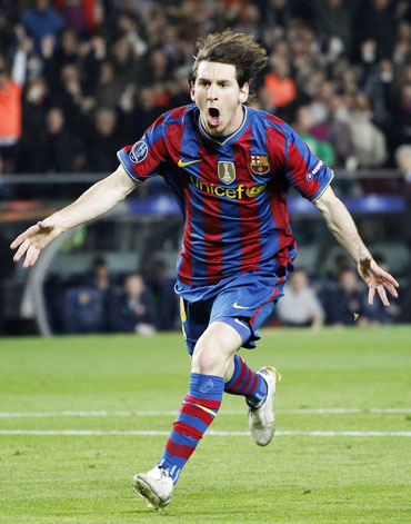 Lionel Messi celebrates after scoring a goal