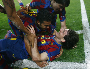 Lionel Messi celebrates with team-mates