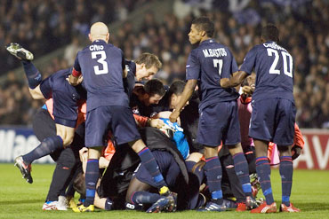 Lyon players celebrate after the match