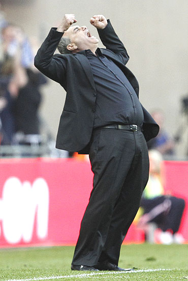 Portsmouth's manager Avram Grant is overjoyed after their FA Cup semi-final win over Tottenham Hotspur