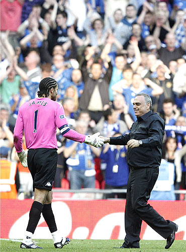Avram Grant and David James celebrate after the victory
