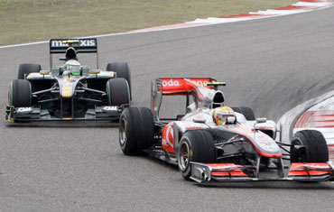 Lewis Hamilton ahead off Red Bull's Heikki Kovalainen