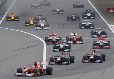Fernando Alonso leads the pack