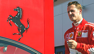 Michael Schumacher enters the Ferrari paddock in 2006