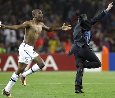 Samuel Eto'o (left) celebrates with coach Jose Mourinho