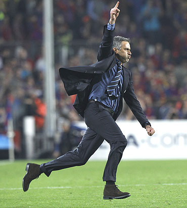 Jose Mourinho celebrates after qualifying for the final