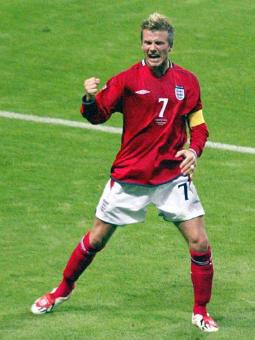 David Beckham celebrates scoring a penalty against Argentina in the 2002 World Cup
