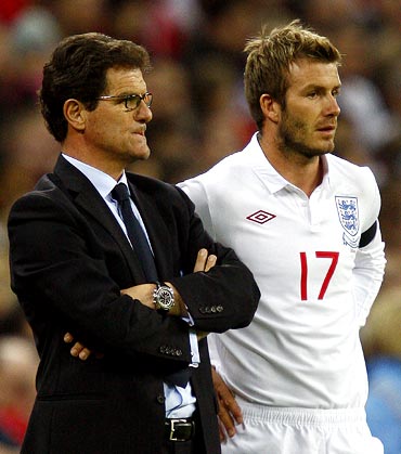 David Beckham with England manager Fabio Capello