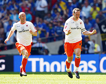 Blackpool's Charlie Adam (right) and Stephen Crainey celebrate
