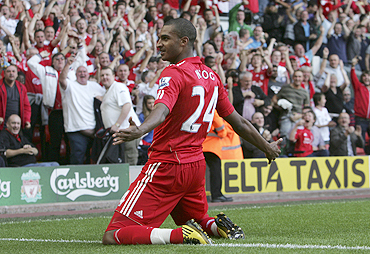 Liverpool's David Ngog celebrates after scoring against Arsenal