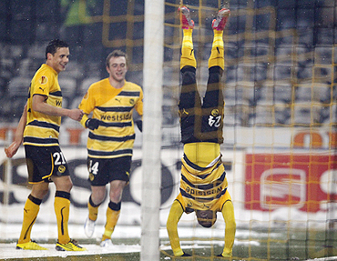 Young Boys Berne's Emmanuel Mayuka (right) celebrates with teammates after scoring against VfB Stuttgart on Wednesday
