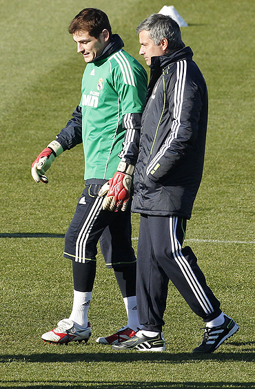 Real Madrid's coach Jose Mourinho (right) with Iker Casillas