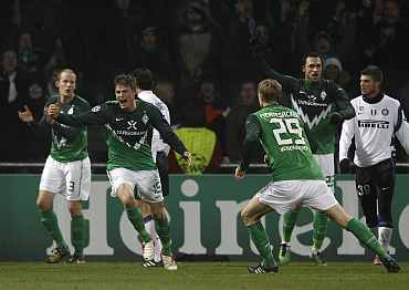 Werder Bremen's Sebastian Proedl celebrates after scoring against Inter Milan during their Champions League Group A match at the Weser stadium