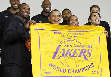 US President Barack Obama (2nd from left) with members of the LA Lakers NBA basketball team