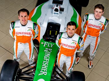 Adrian Sutil (left), Vitantonio Liuzzi (centre) with test driver Paul di Resta